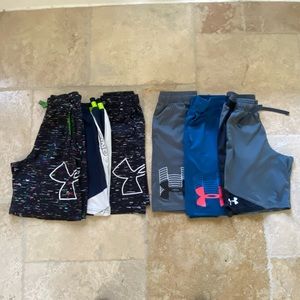 6 pair Boys Under Armour shorts in good condition.